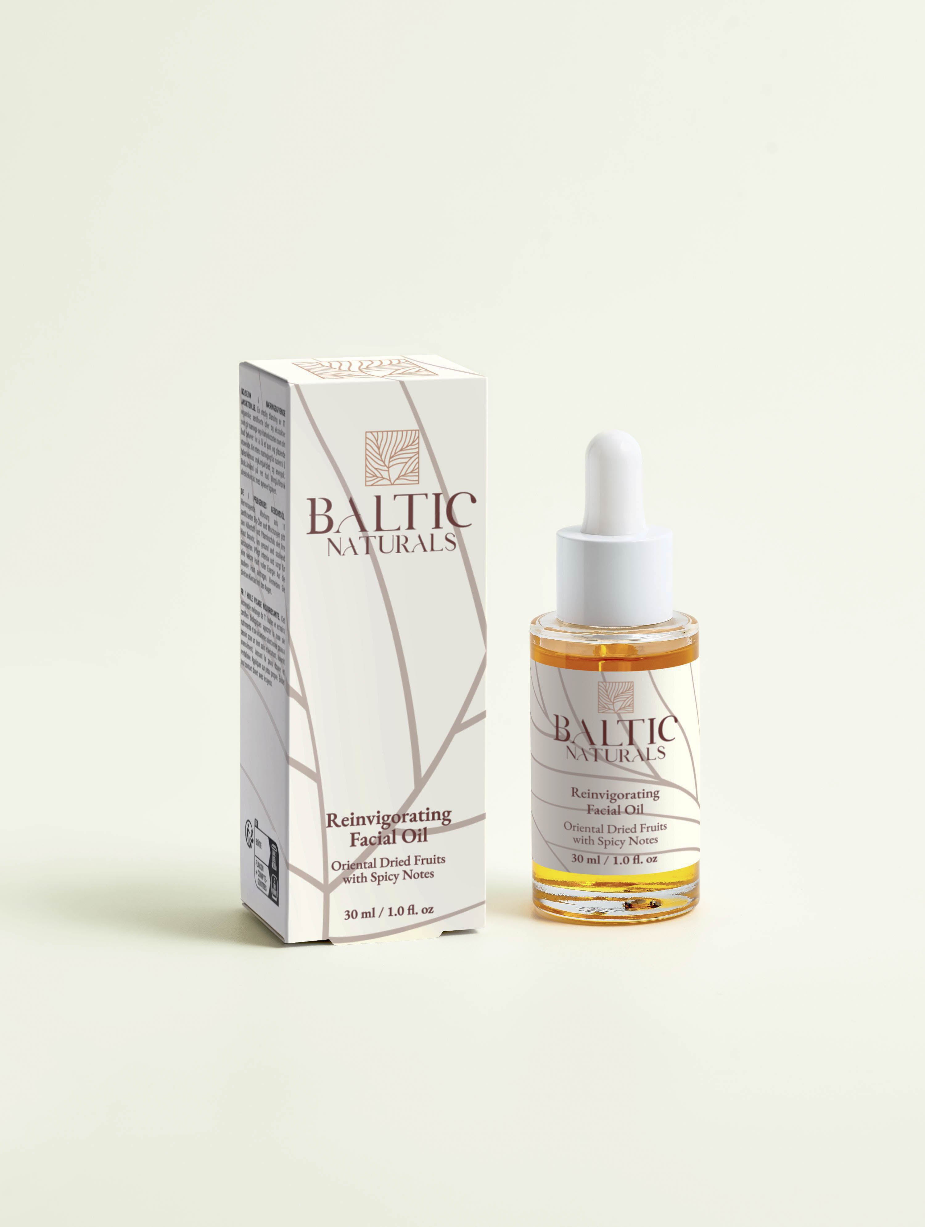 Reinvigorating Facial Oil 30ml displayed from the front with its box, emphasizing the elegant packaging and product label.