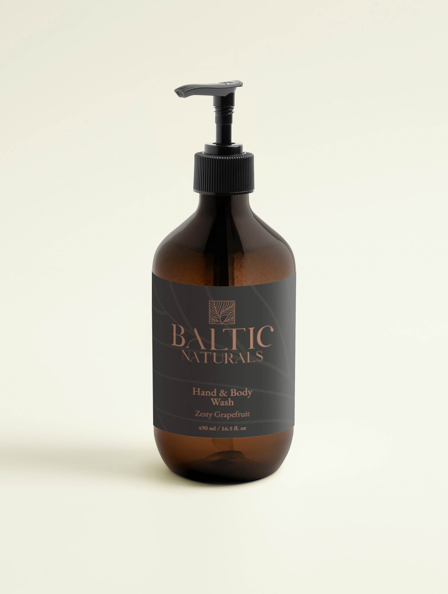 Baltic Naturals' Hand & Body Wash, Zesty Grapefruit, with sleek bottle design in studio setting.